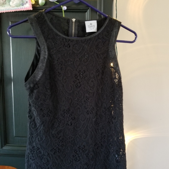 Sexy, lacey, zip back top, leather trim